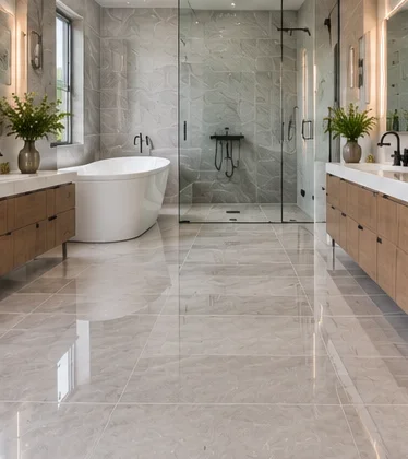 Light ceramic floor tiles in a bright bathroom